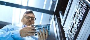image of tech in server bay